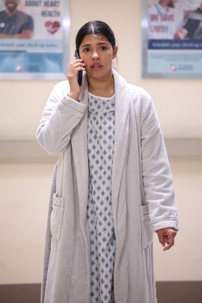 celina in a hospital gown the rookie s6e1